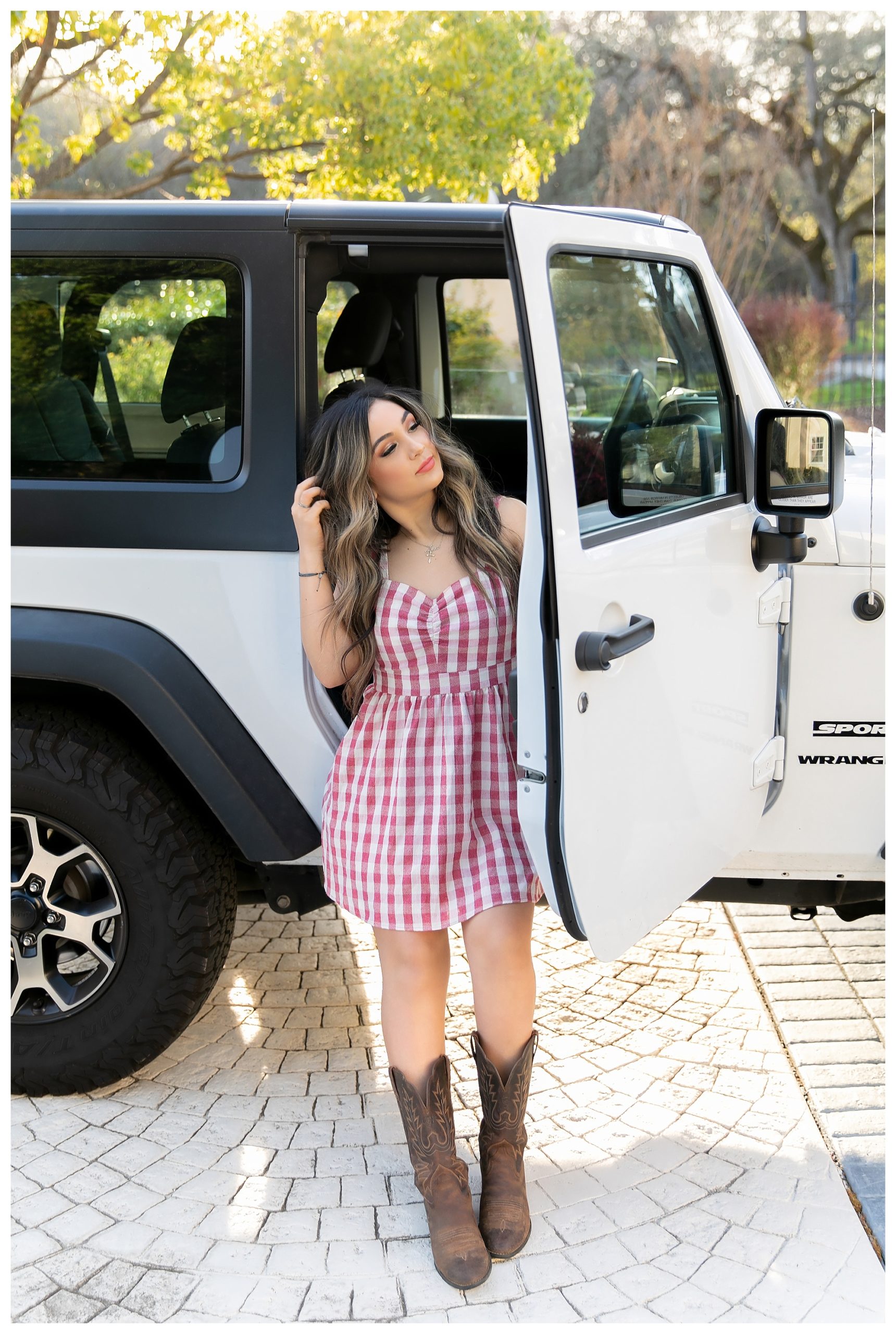 Teen girl by white Jeep