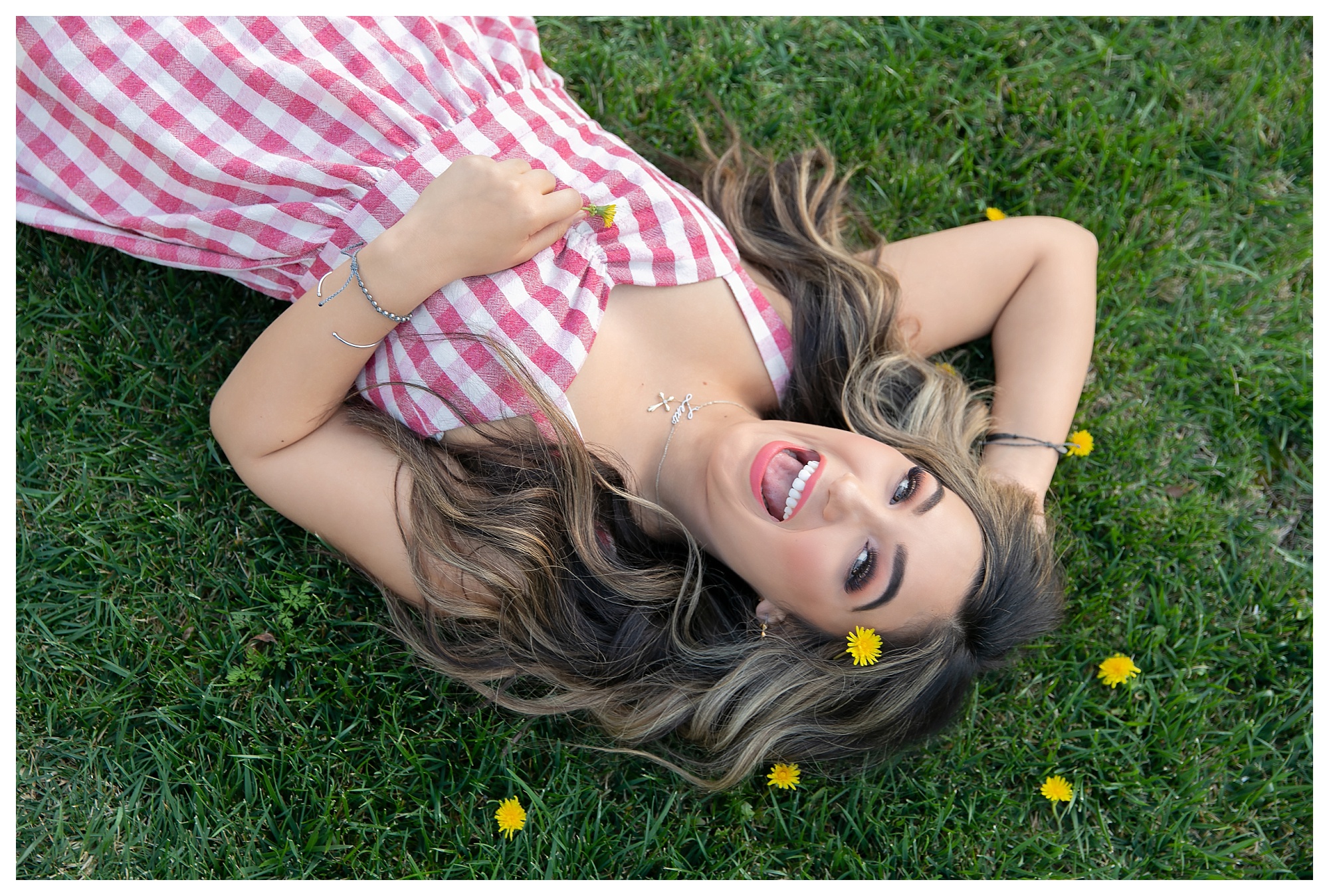 Teen girl in dandelion flowers