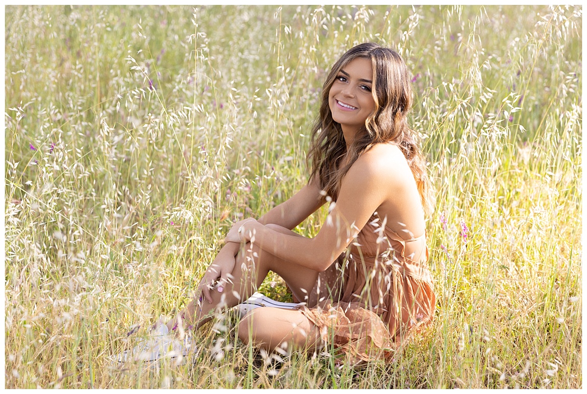 Teen girl in grassy field