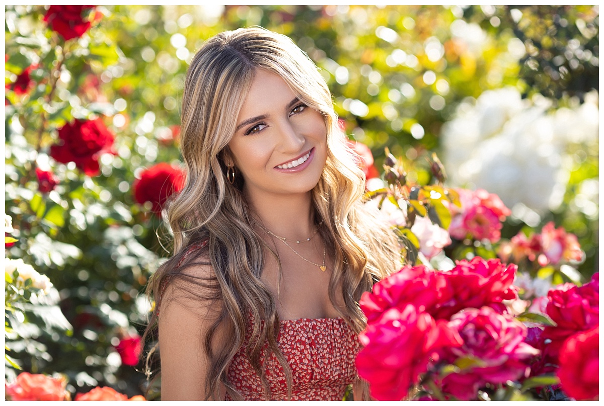 Teen girl senior portraits in roses